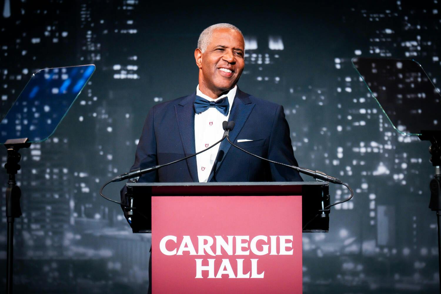 Robert F. Smith, Chairman, Carnegie Hall Board of Trustees standing at a Carnegie Hall podium