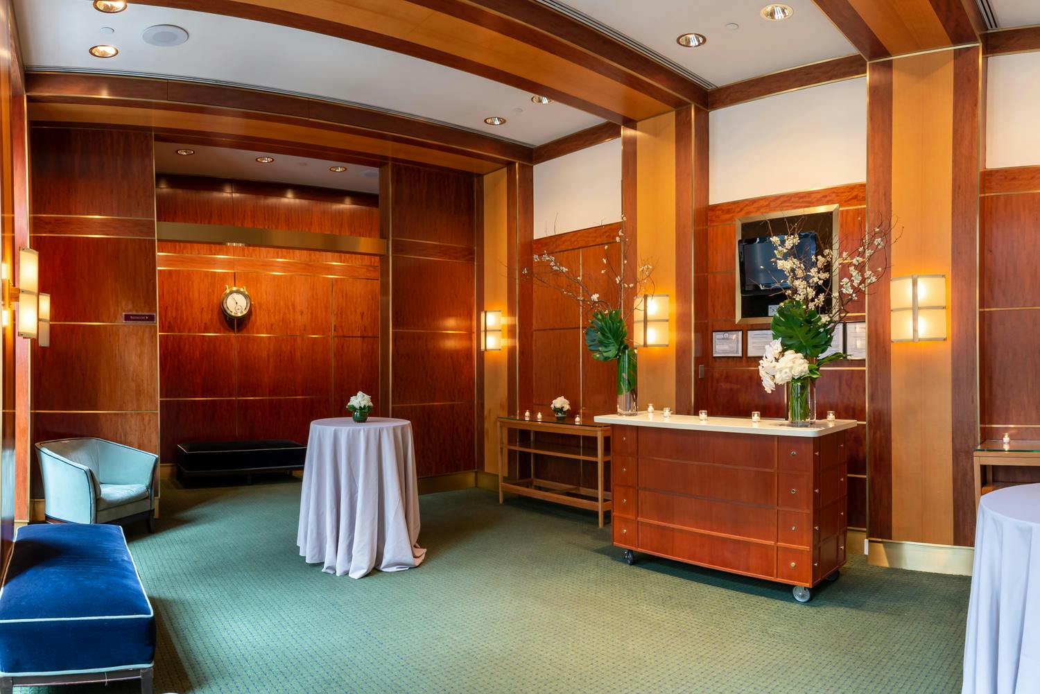 The Jacobs Room, elegantly appointed with wood paneling and soft seating
