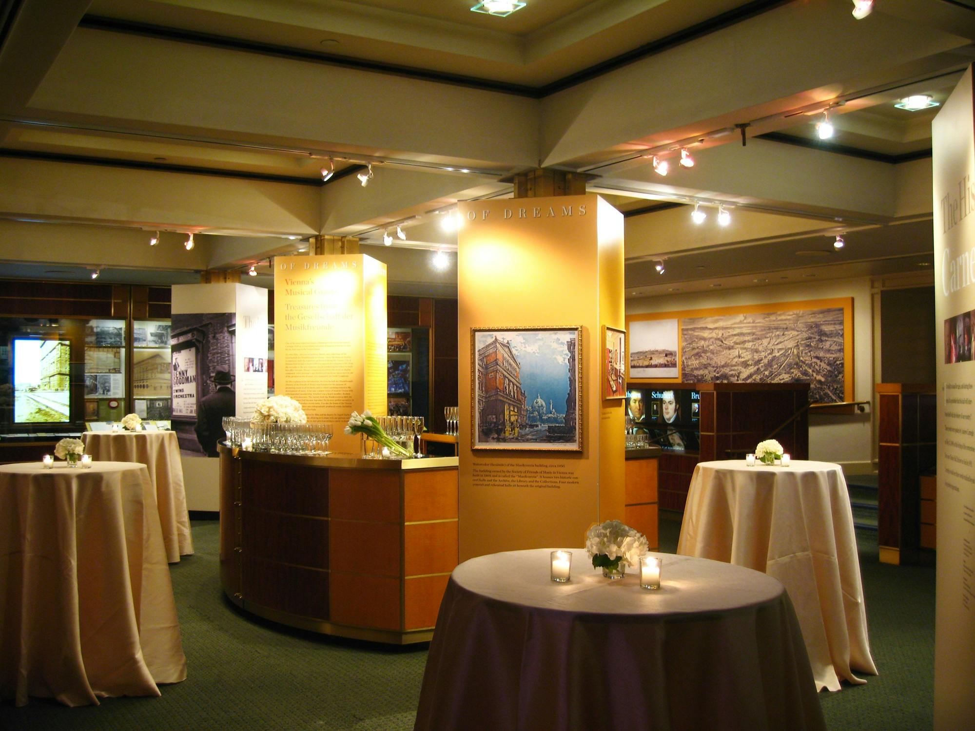 The Rose Museum and its brightly lit exhibit cases are ready for guests with a bar and high tables