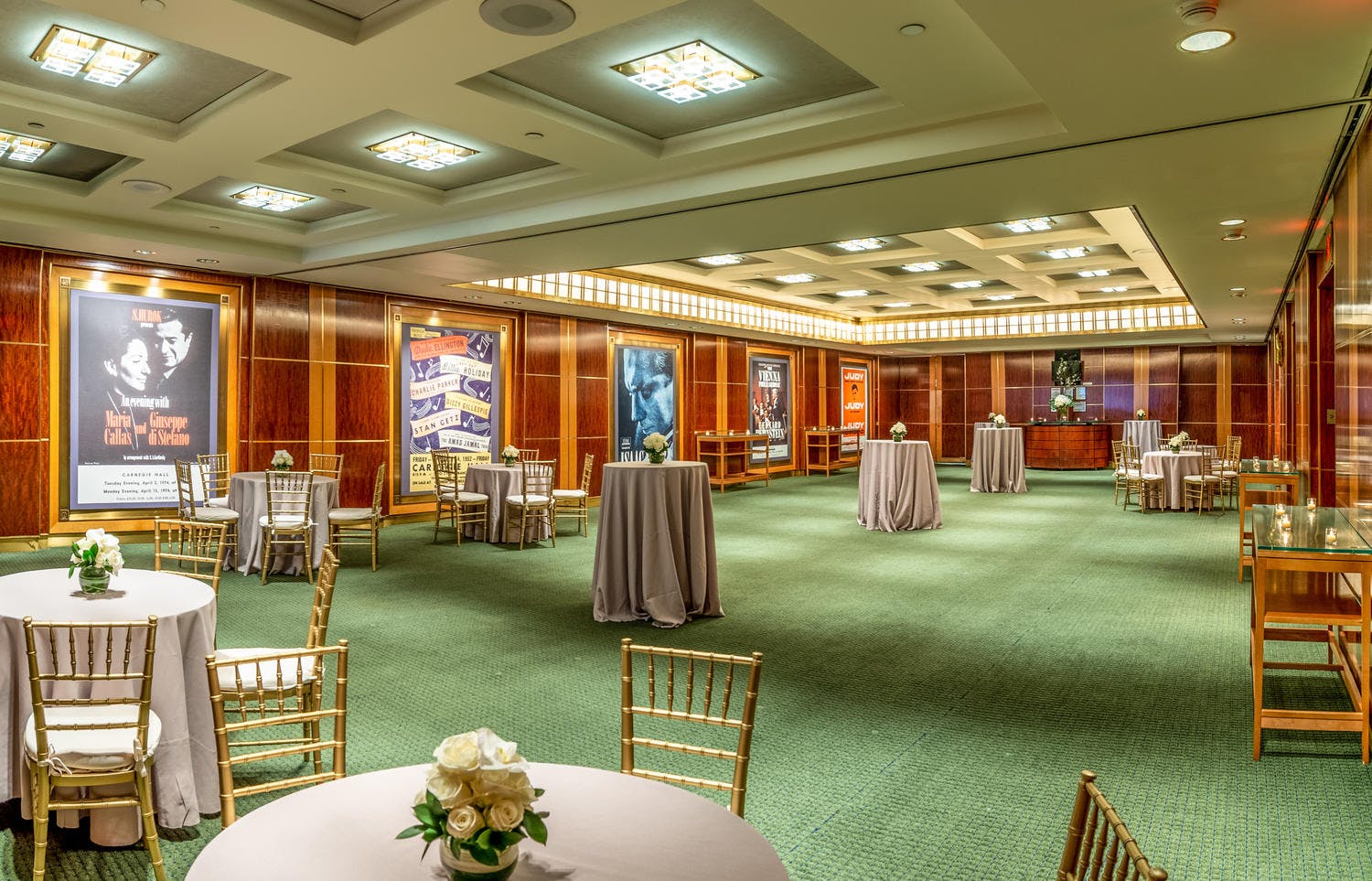 Rohatyn and Shorin Club rooms set with high and low cocktail tables and a bar for a reception