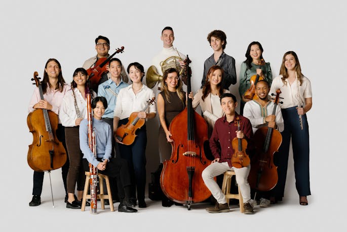 The musicians of Ensemble Connect pose together with their instruments