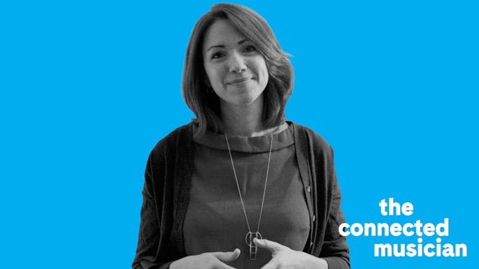 Ensemble Connect Assistant Director Deanna Kennett smiling to the camera