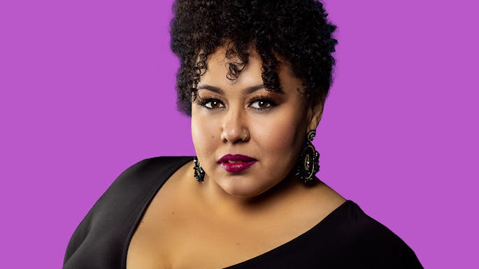 Brianna against a purple background