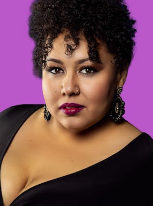 Brianna against a purple background