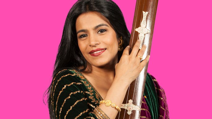 Falu against a purple background