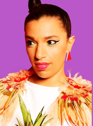 Magda against a purple background