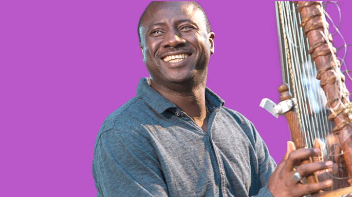 Yacouba against a purple background