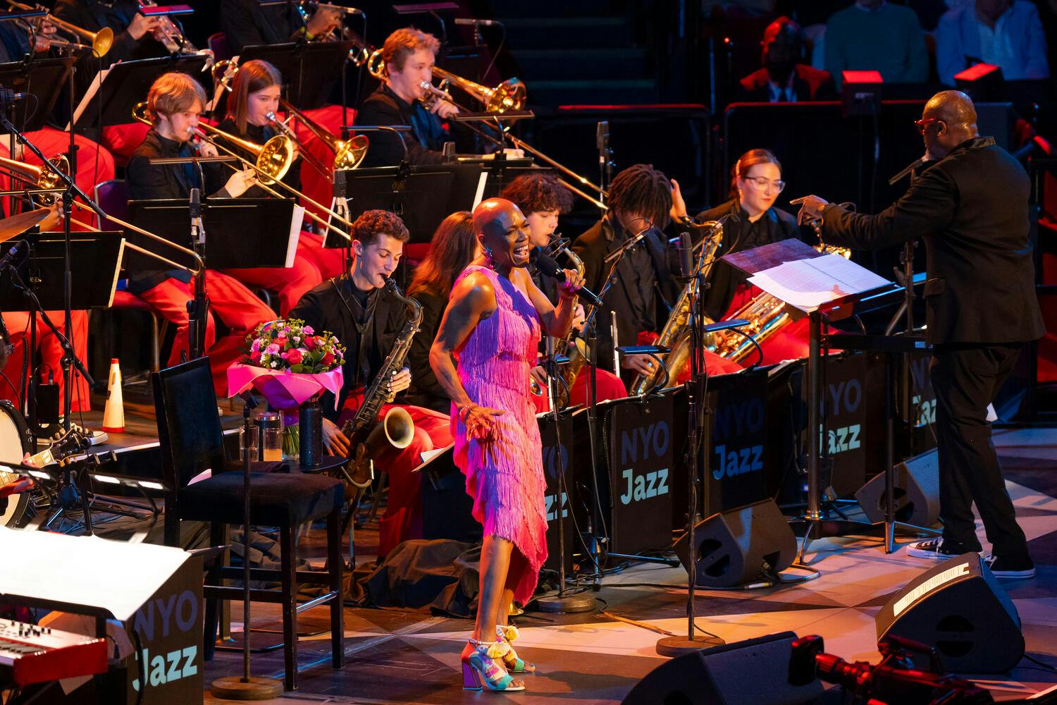 Dee Bridgewater sings on stage as Sean Jones conducts the NYO Jazz Band