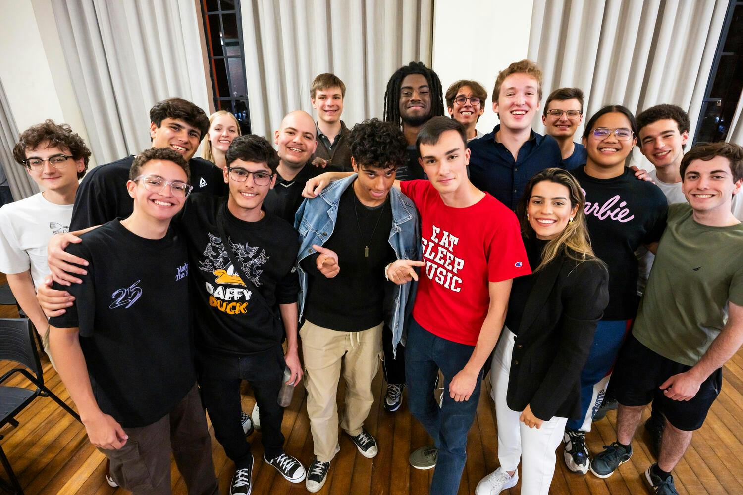 Smiling NYO-USA musicians pose together