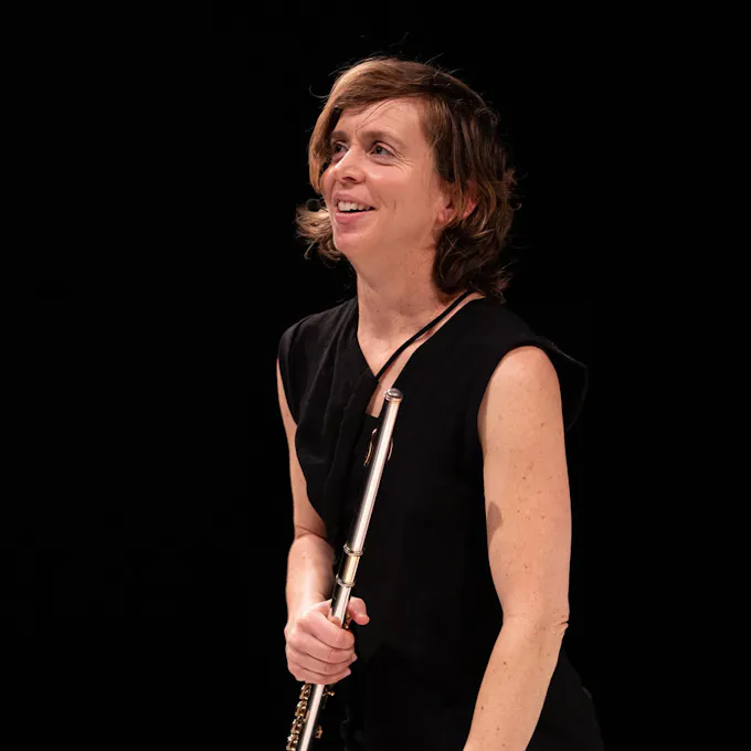 Claire Chase holding her flute
