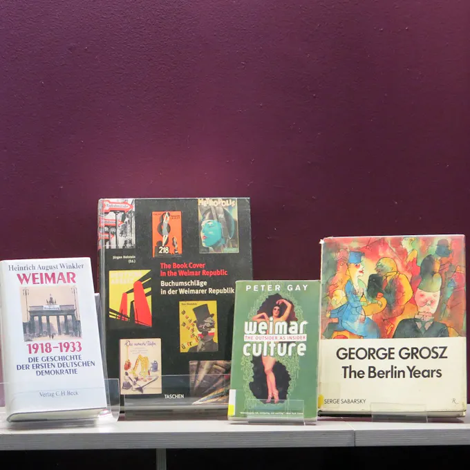 Four books on plastic stands on the subject of the Weimar Era