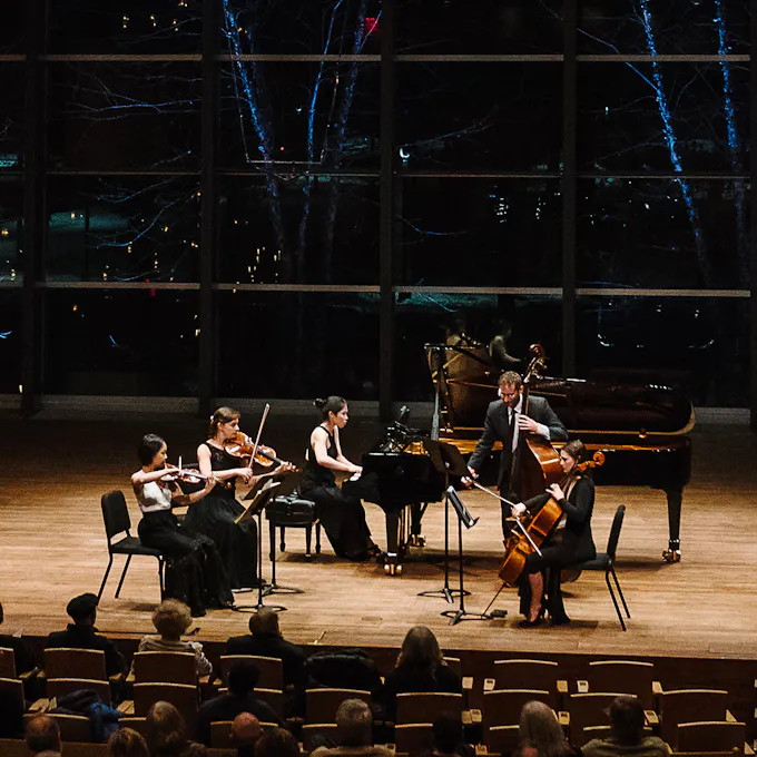Members of Ensemble Connect performing on stage