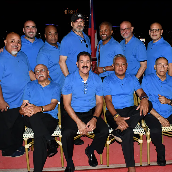 Members of Son Del Monte sitting and standing