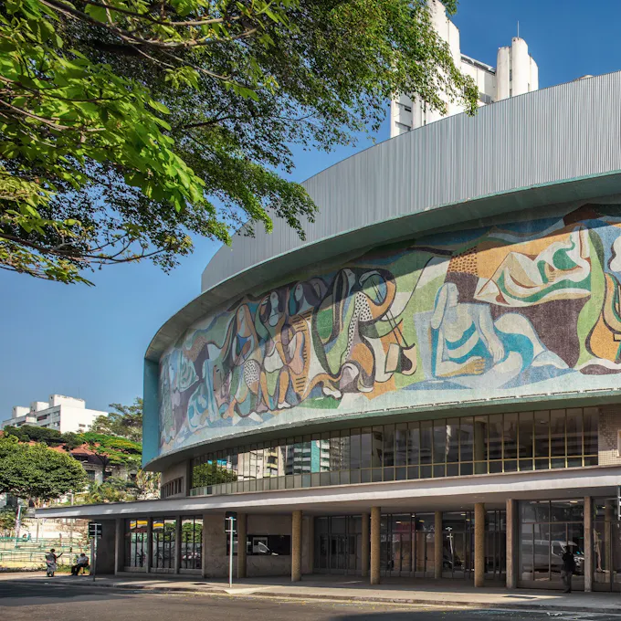 A performance hall painted with a mural of women