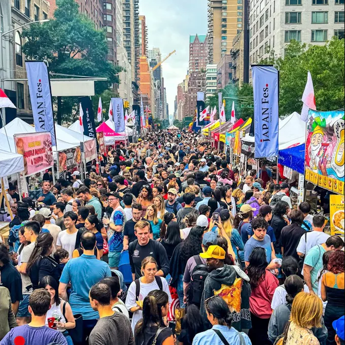 A crowd gathered on a city street for Japan Fes