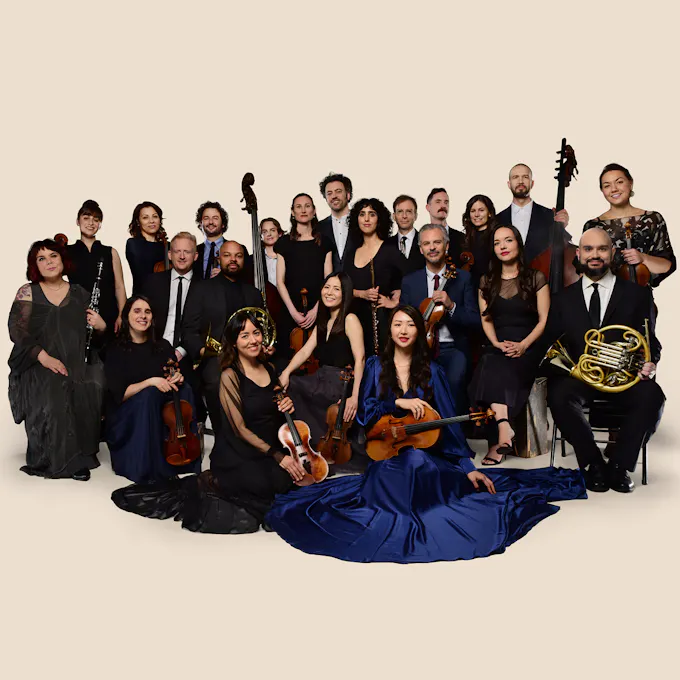 Musicians of The Knights pose together with their instruments