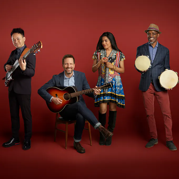 Members of American Patchwork Quartet pose together with their instruments