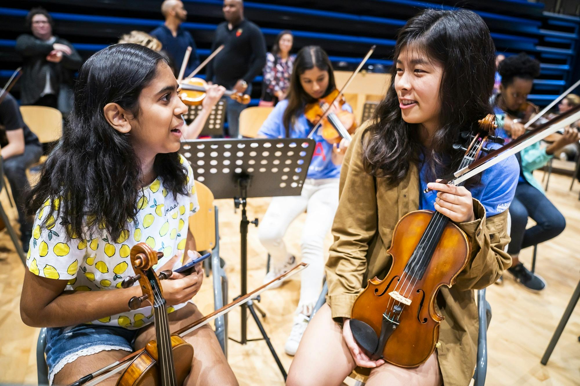 Erica Hwang chatting with a member of RCO Young, the Concertgebouw’s international youth orchestra.