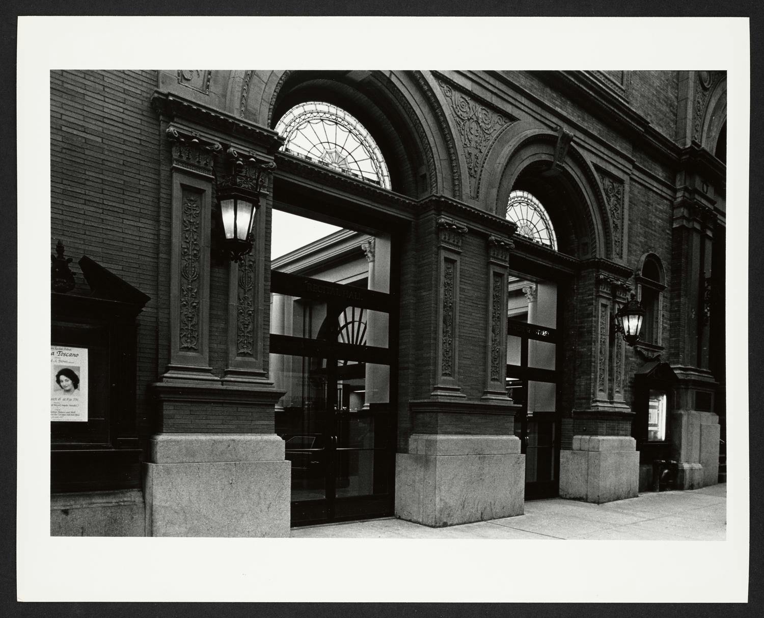 Black-and-white photo of the restored entrances to Carnegie Recital Hall, 1983