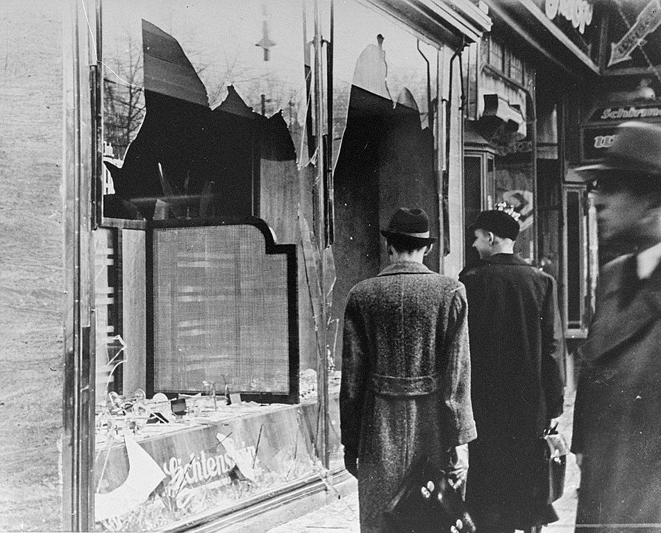Photo of destroyed Jewish shops the day after Kristallnacht, 1938