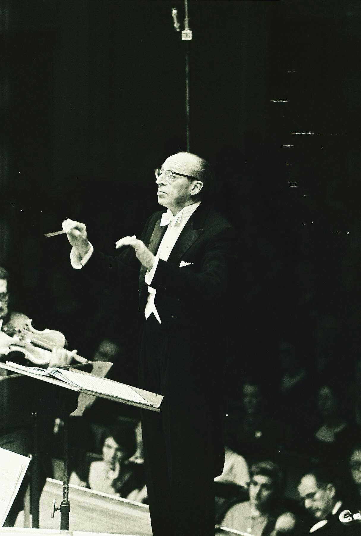 Photo of Aaron Copland conducting the New York Philharmonic, 1960