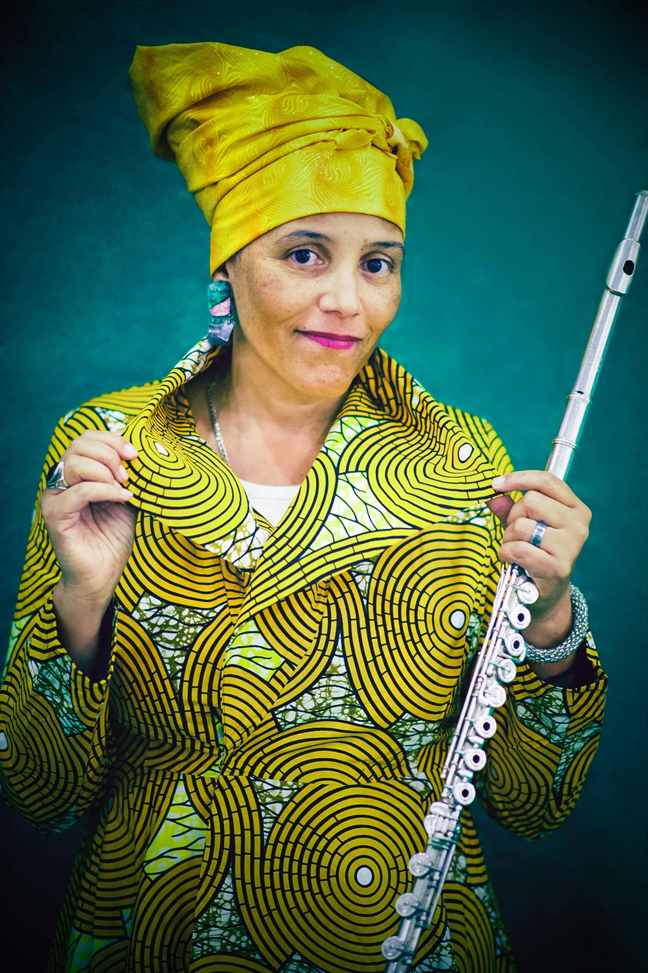 Photo of Nicole Mitchell holding a flute