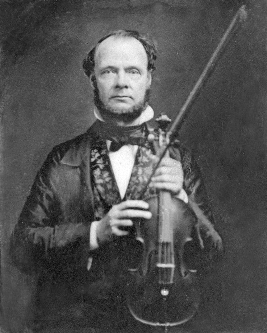 Black and white portrait of Ureli Corelli Hill