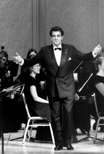 Plácido Domingo performing at an AIDS benefit with Orchestra of St. Luke’s, 1988
