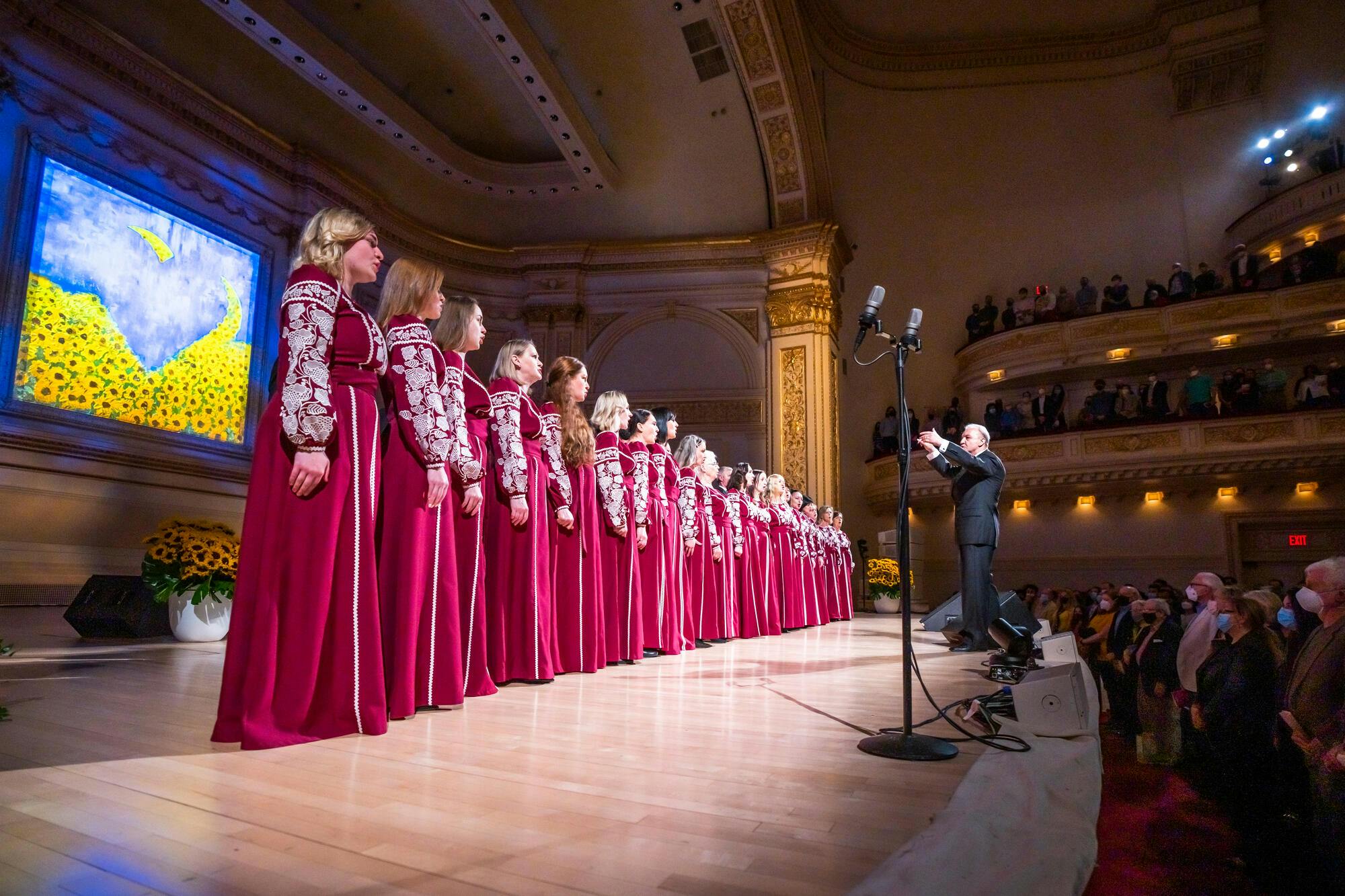 Image of the Ukrainian Chorus Dumka of New York singing on stage at Carnegie Hall, 2022