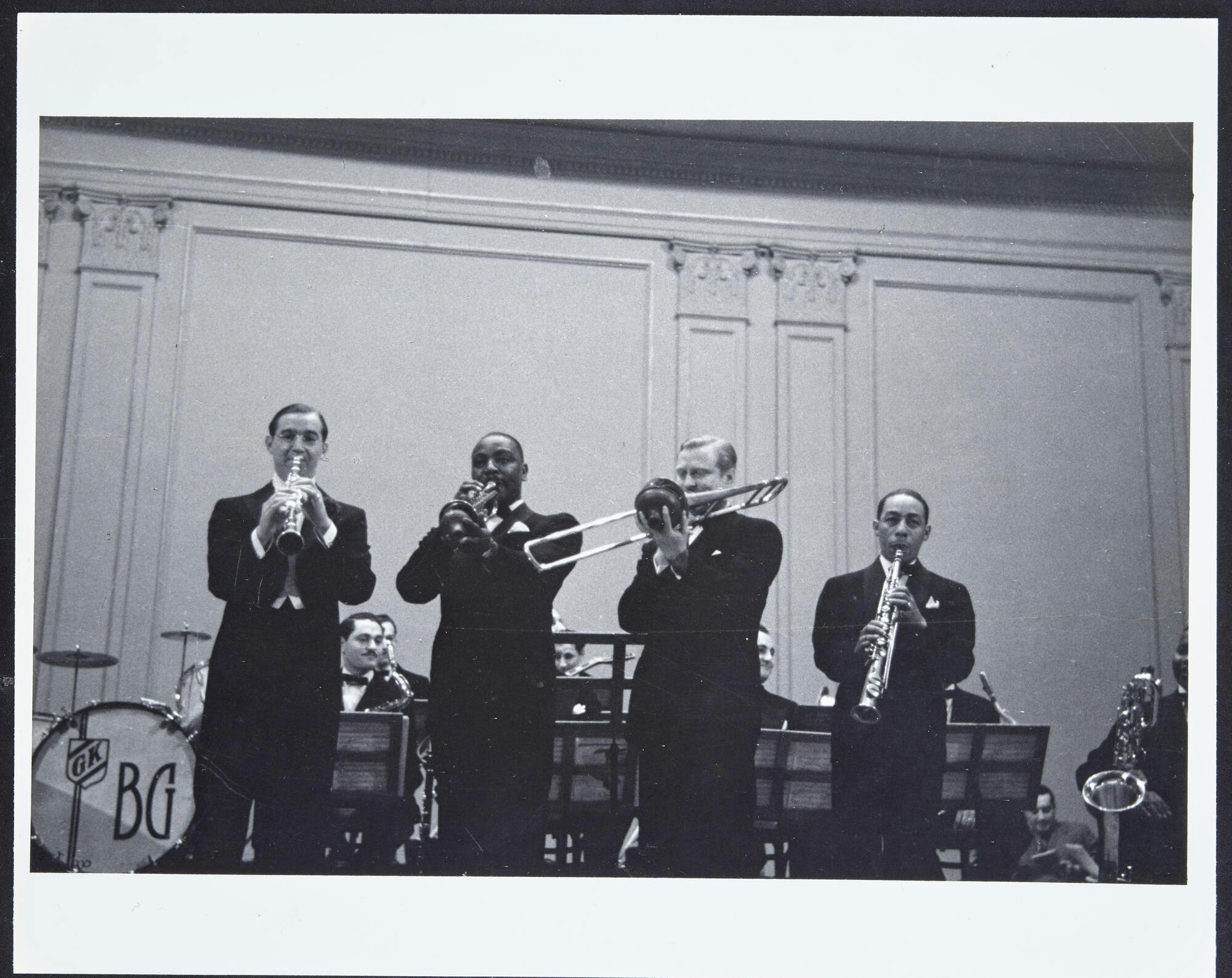 Benny Goodman, Cootie Williams, Vernon Brown, and Johnny Hodges on stage, 1938