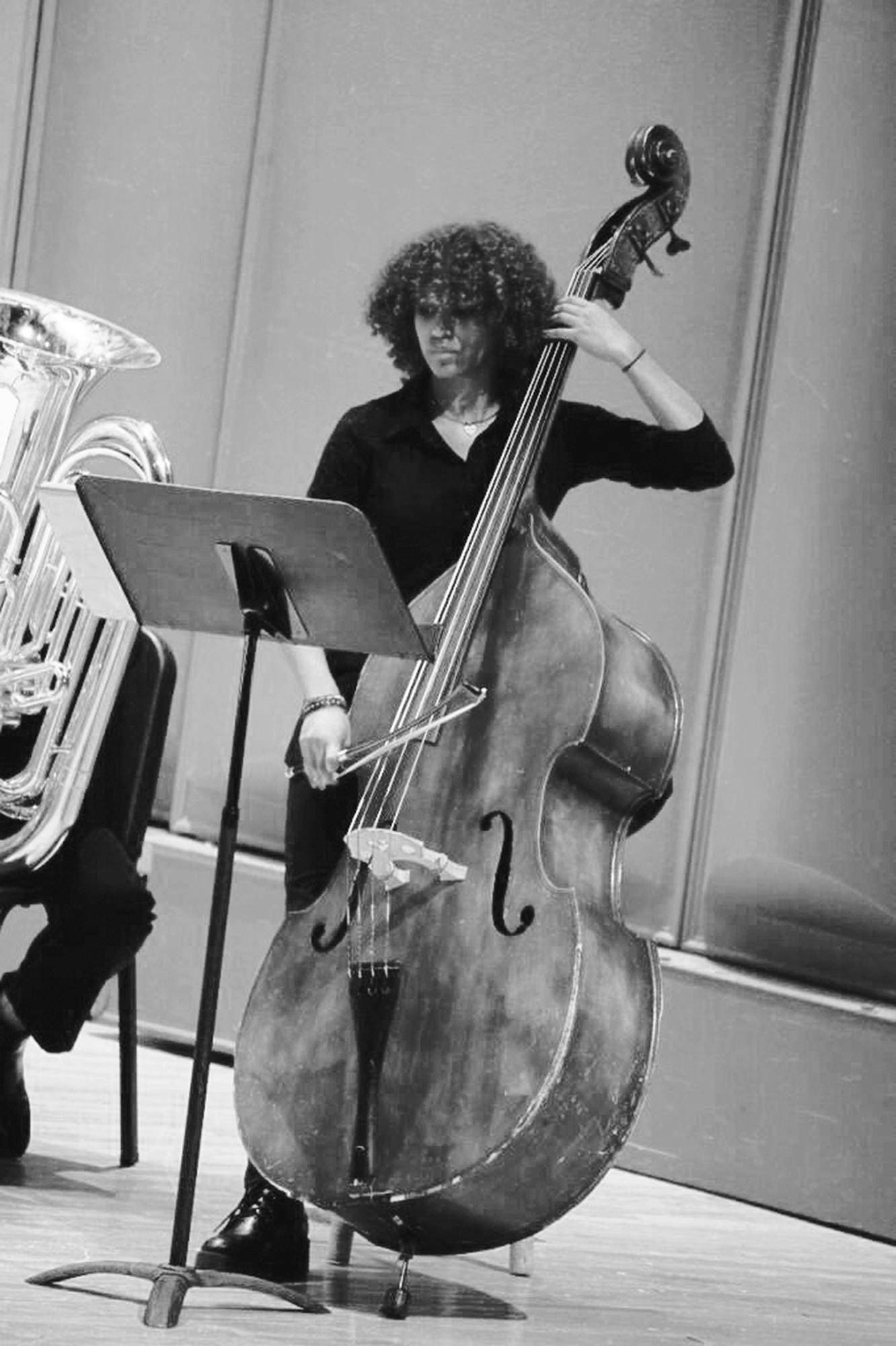 Liana Logan playing the bass