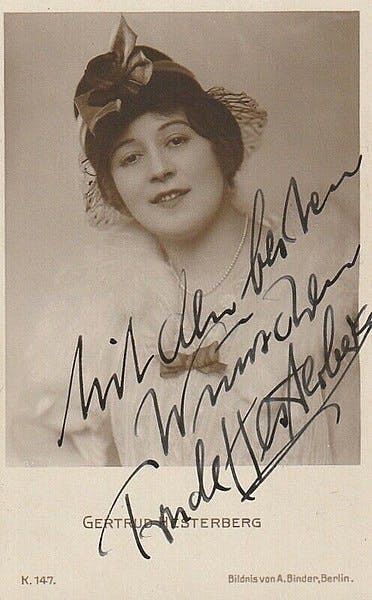 Black and white photo of Trude Hesterberg with her autograph in black ink across the photo