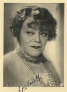 Black and white photo of Rosa Valetti with her autograph in black ink on the bottom