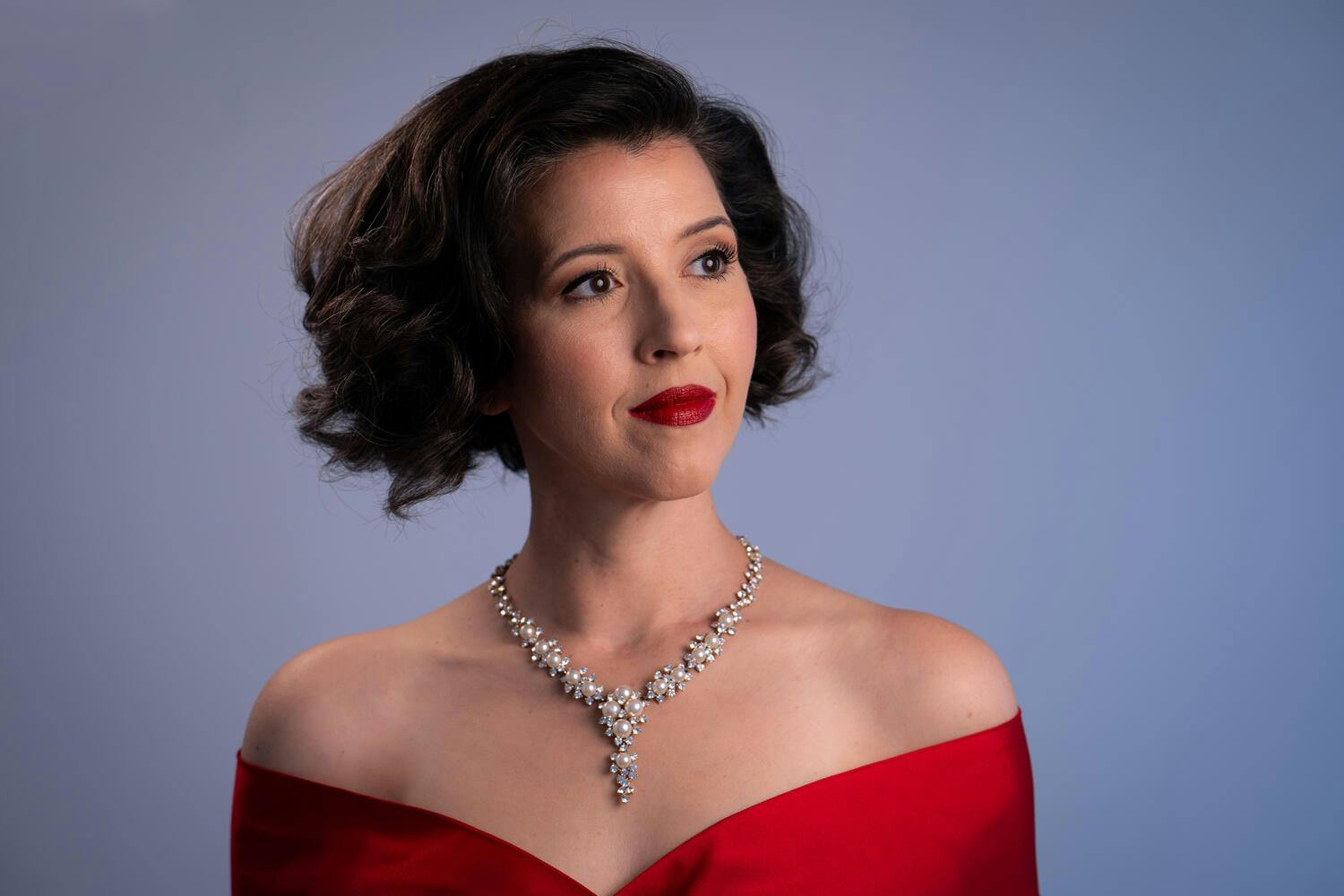 Lisette Oropesa looking to the side