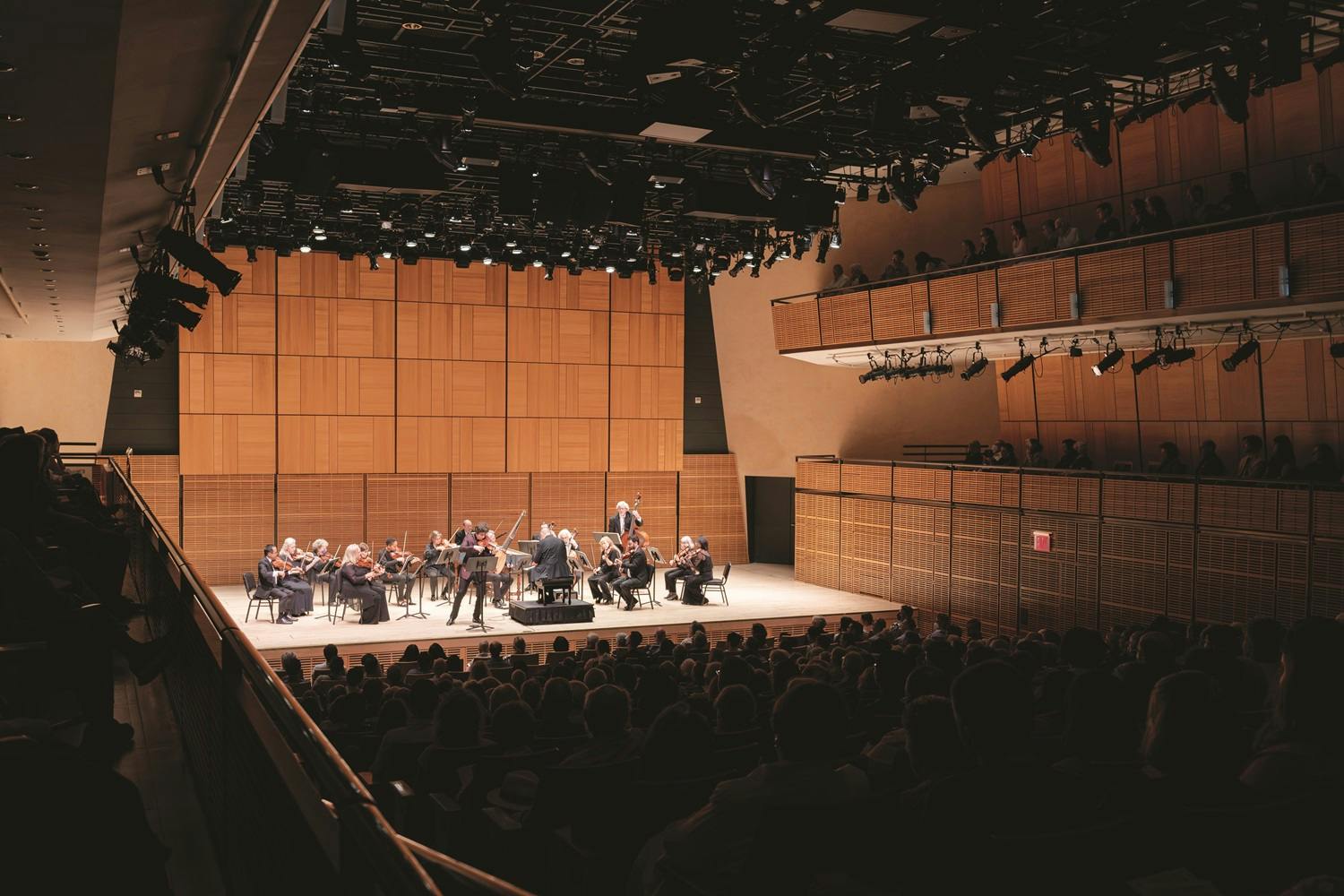 Orchestra of St. Luke’s performing on stage in Zankel Hall