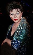 Photo of Jim Bailey impersonating Judy Garland in London, 2006.