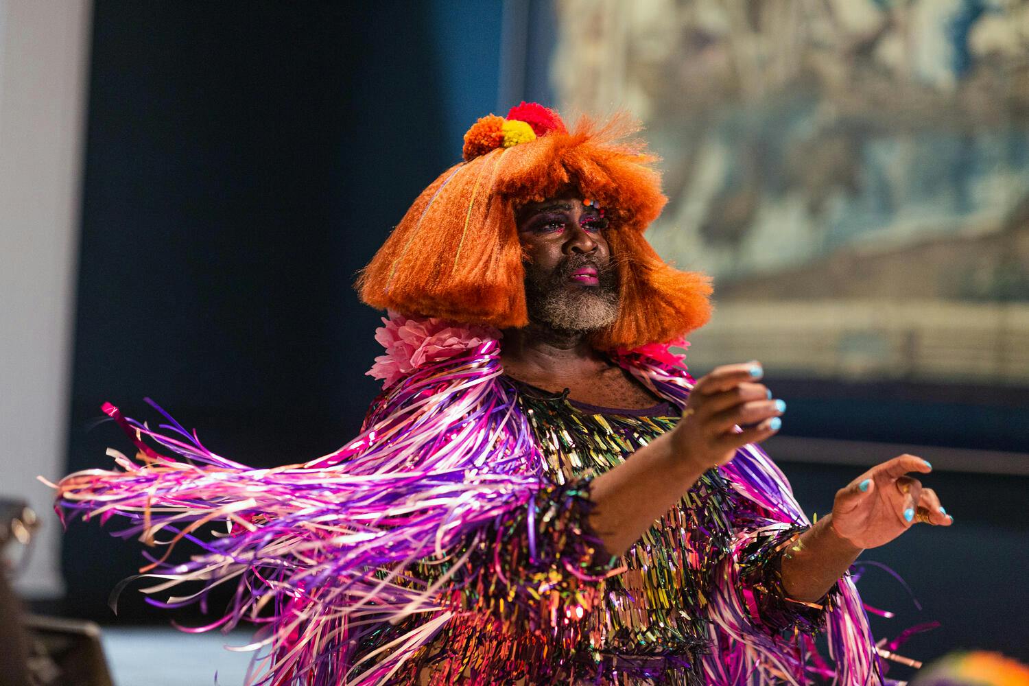 Le Gateau Chocolat dancing with their arms out, 2024.