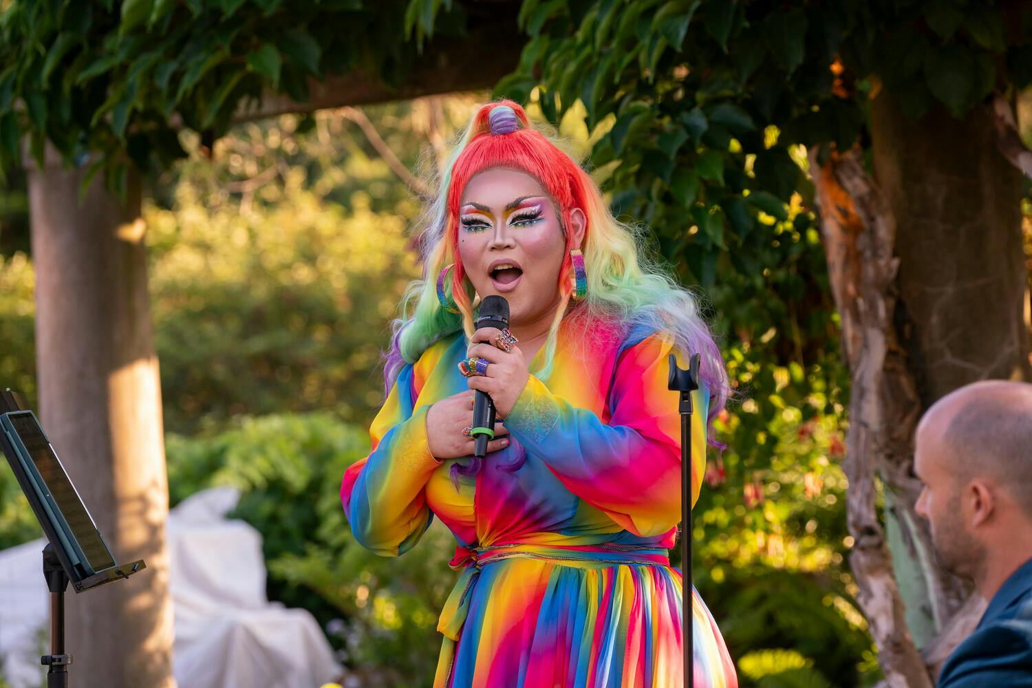 Photo of Jasmine Rice LaBeija singing at an outdoors Citywide concert, 2024.