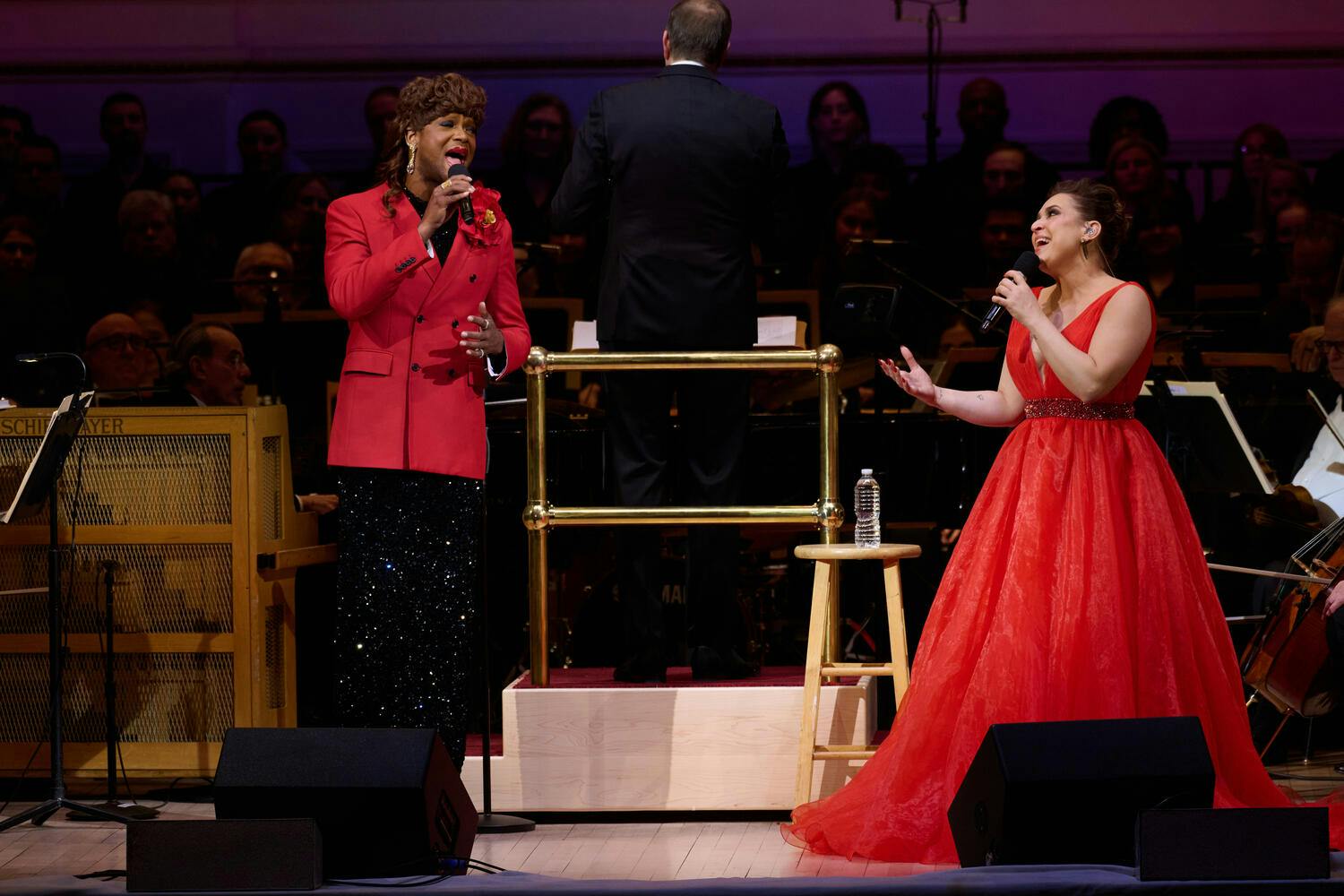 J. Harrison Ghee and Jessica Vosk singing on stage at Carnegie Hall with The New York Pops, 2024.