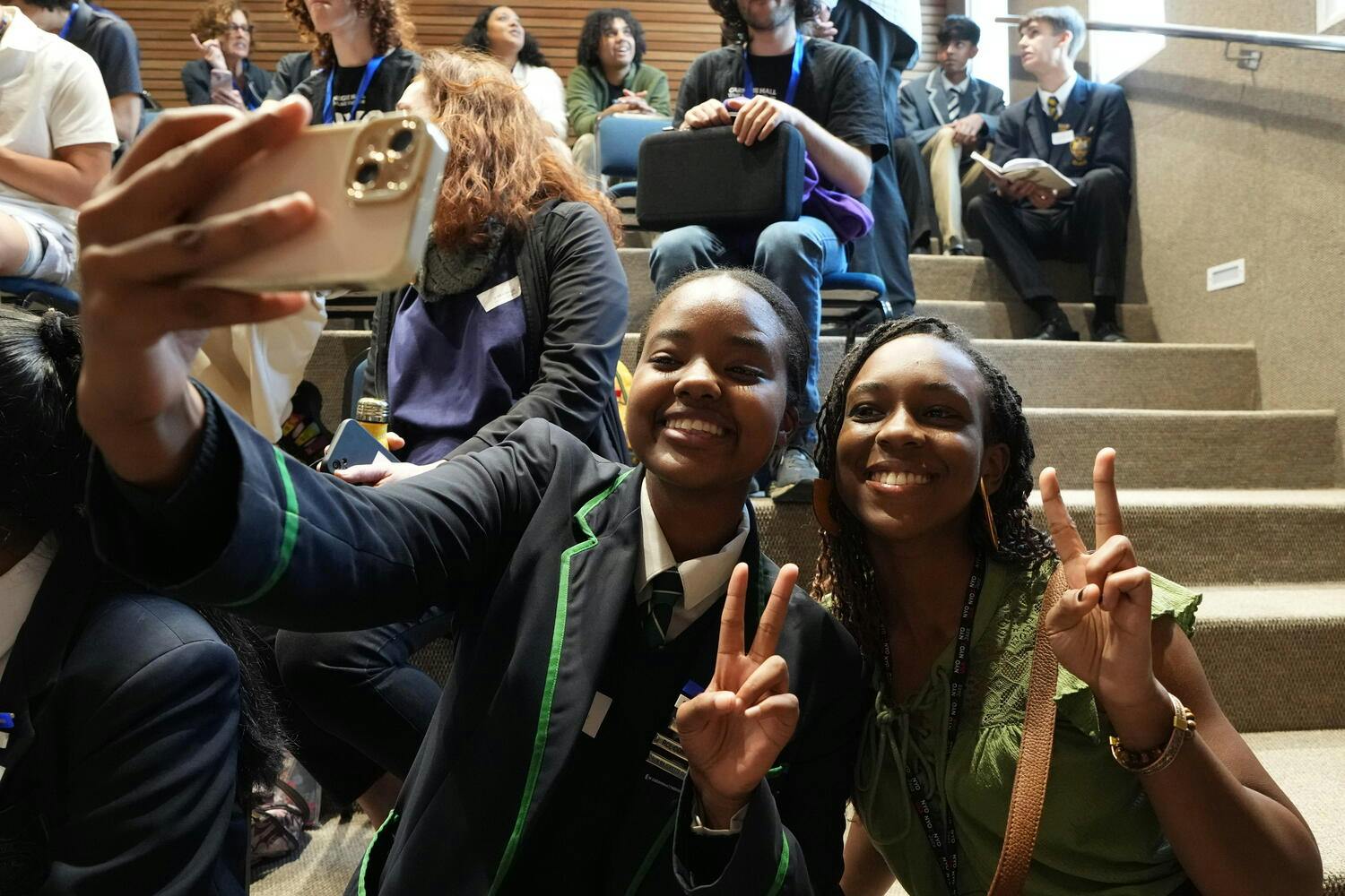 Two students talking a selfie at the NYO Jazz 2024 Workshop at Durban High School.