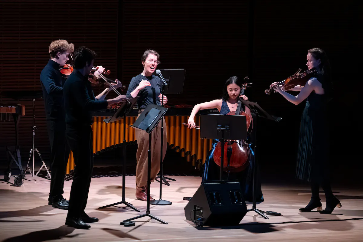 Caroline Shaw performing with students from Juilliard in Zankel Hall.