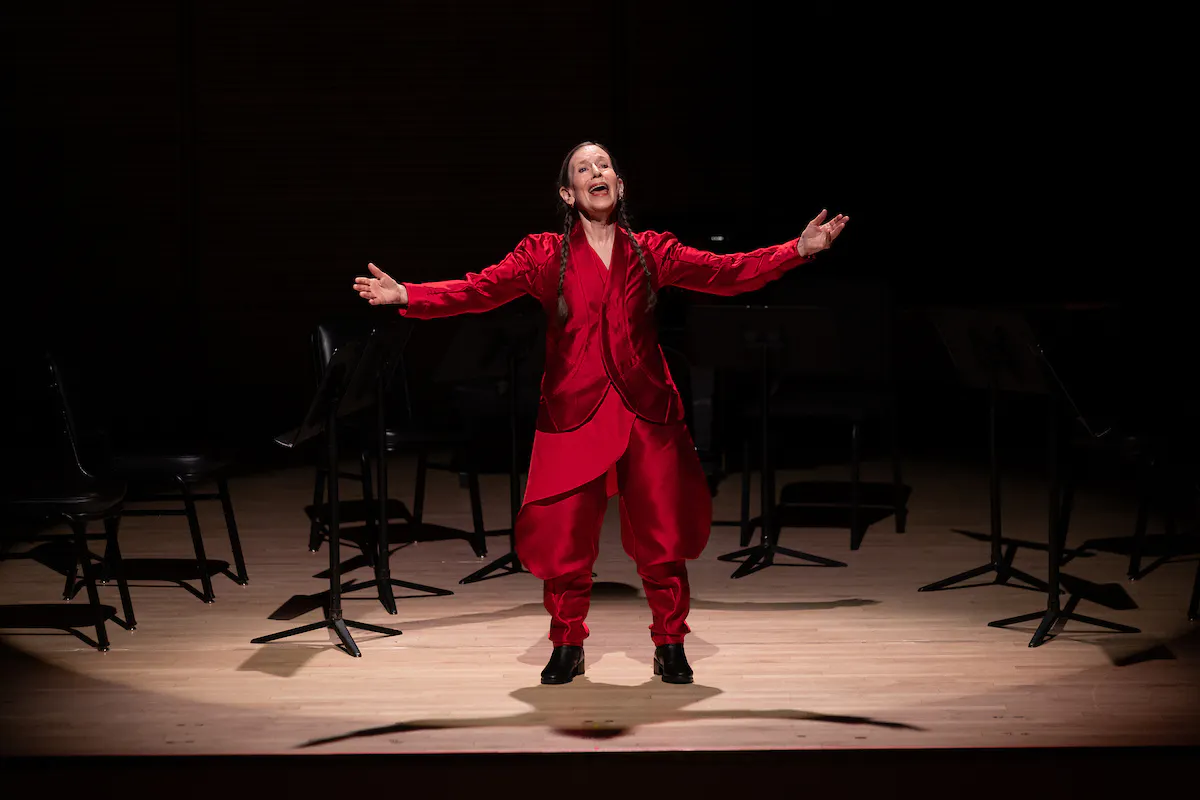 Meredith Monk performing on stage in Zankel Hall.