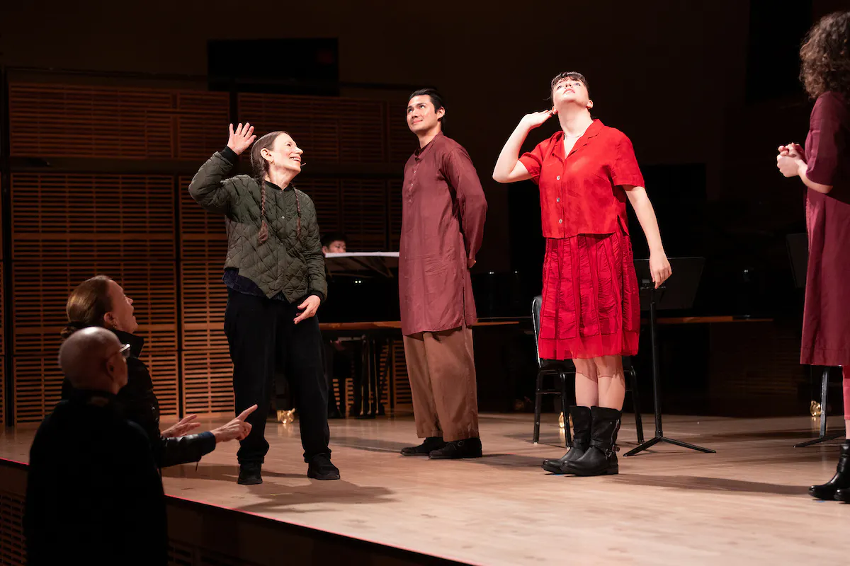 Meredith Monk choreographing the Juilliard students during a rehearsal.
