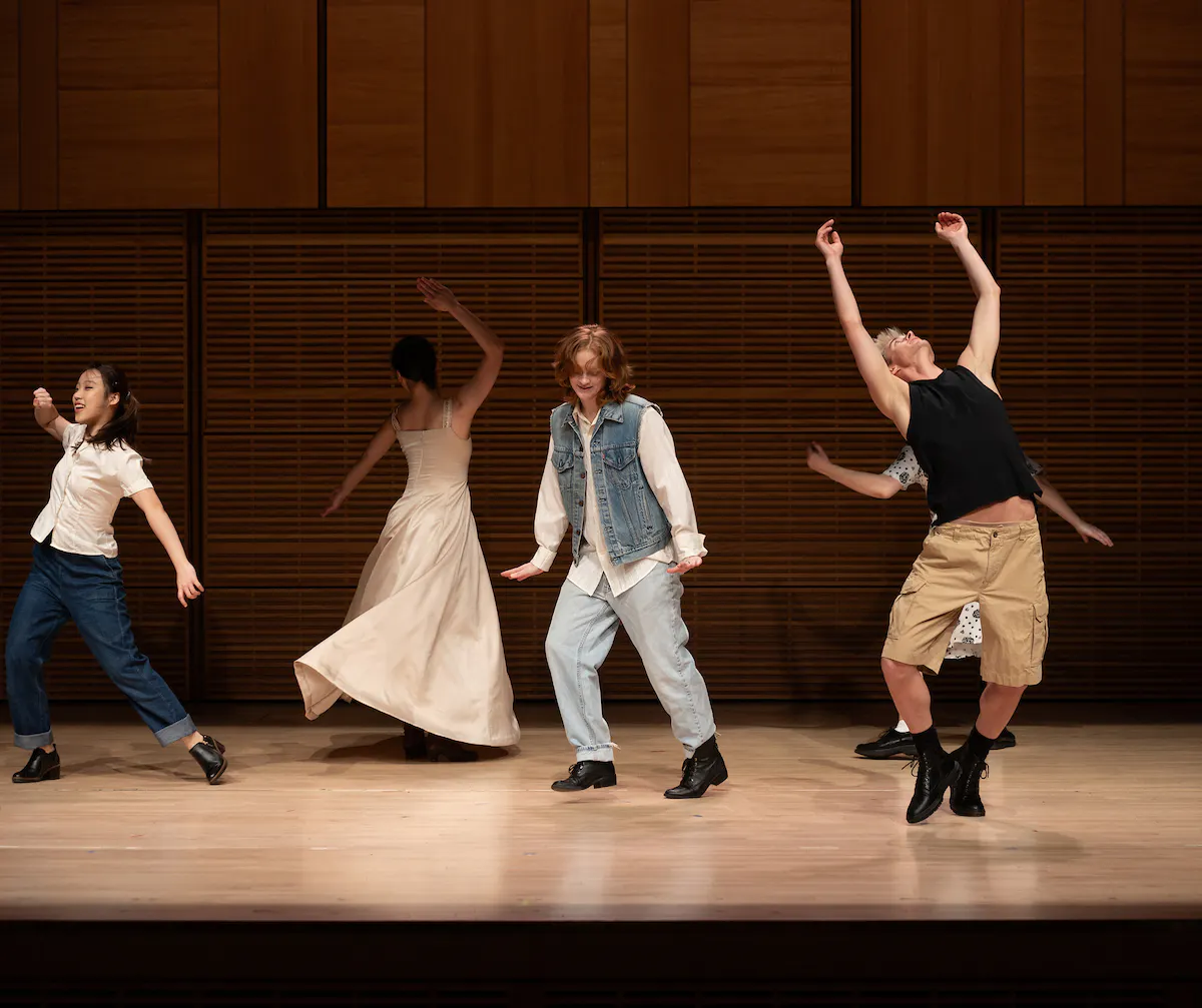 Four students from The Juilliard School dancing on stage in Zankel Hall.