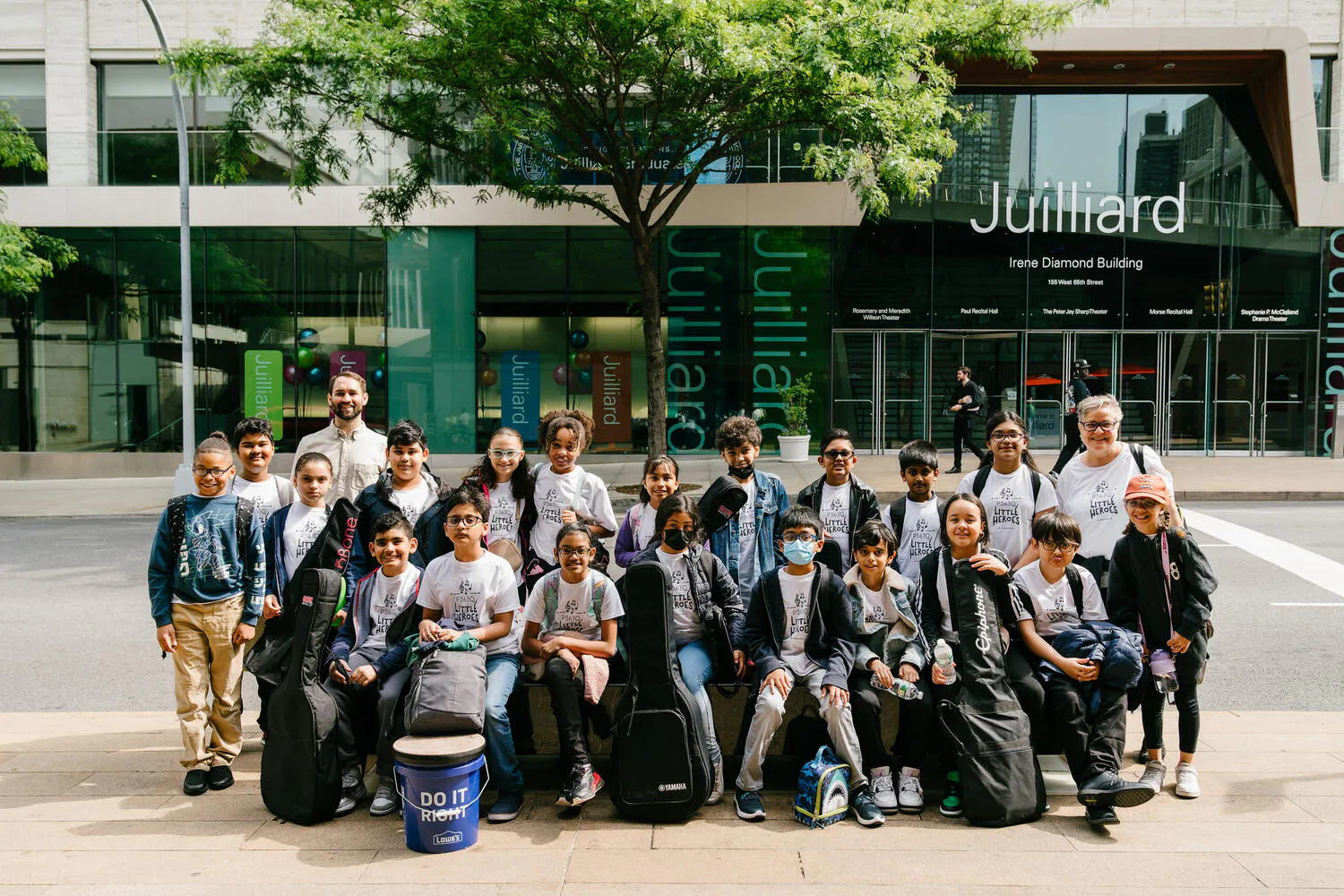 Group photo of Ensemble Connect in front of The Juilliard School.