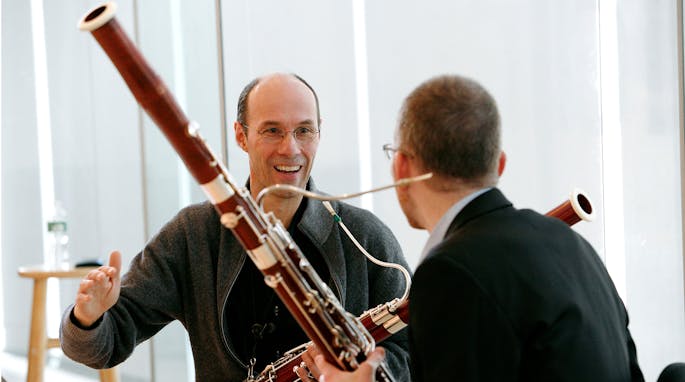 Stefan Schweigert of the Berliner Philharmoniker works with a young bassoonist.
