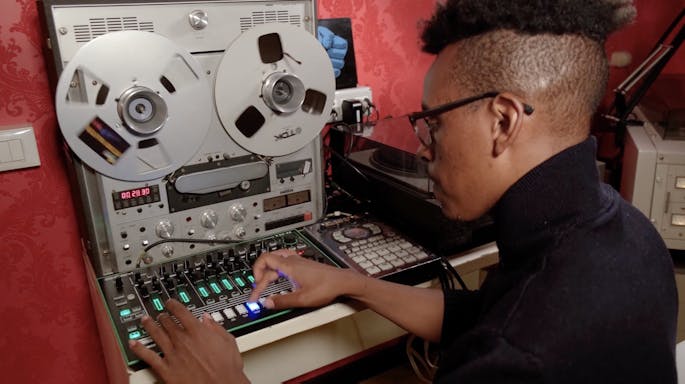 Charles Burchell uses an audio sampler to create a loop.
