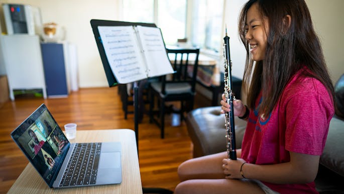 NYO2 oboist MacKenzie Kim plays in a private lesson with faculty member Erik Behr.