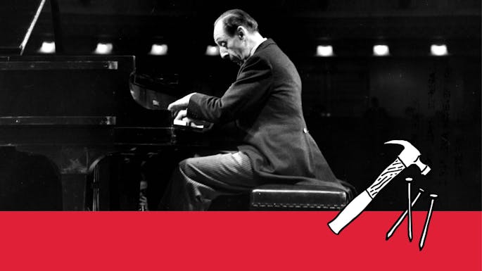 Vladimir Horowitz playing piano on stage