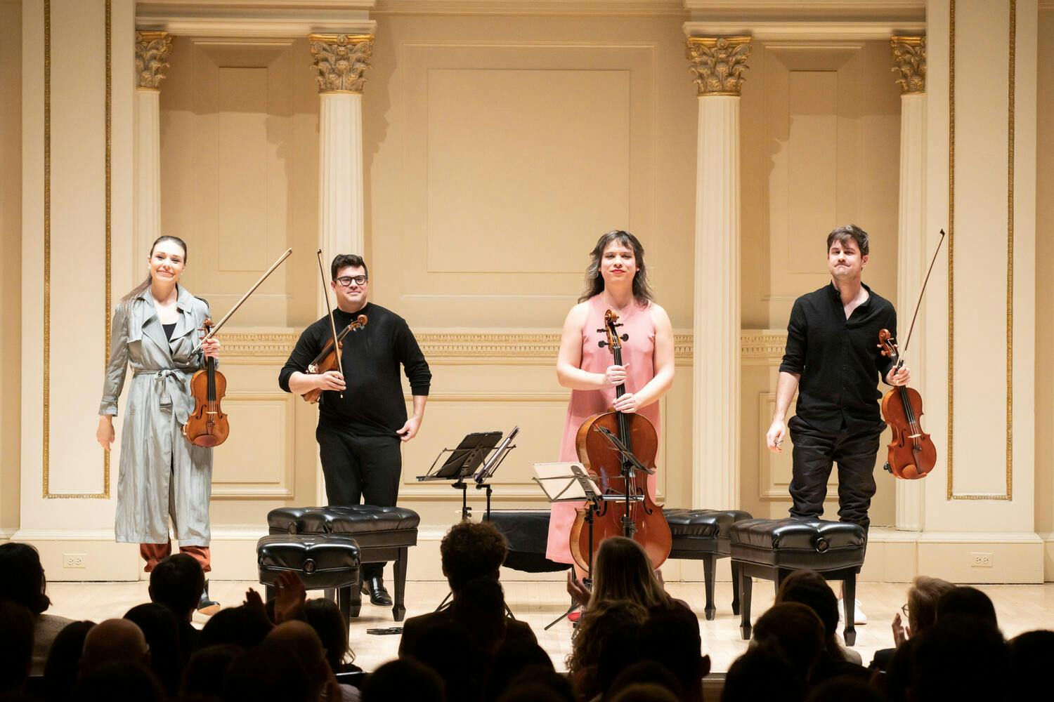 Attacca Quartet standing at the end of the performance
